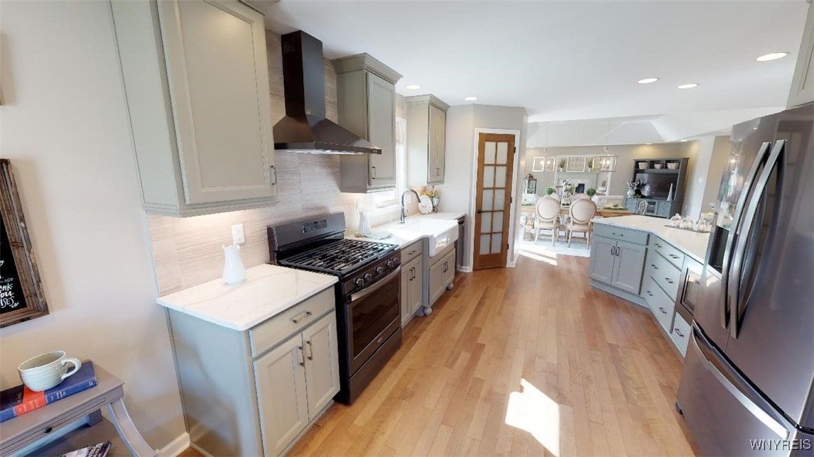 Chandelier, Dining room, Interior, Kitchen, Recessed Lighting, Stainless Steel Appliances, Wood Texture Flooring
