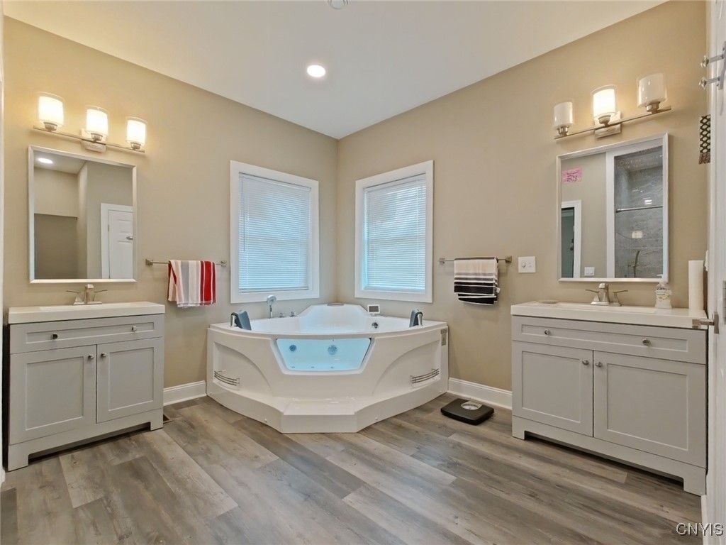 Bathroom, Dual Sink Vanities, Interior, Recessed Lighting, Wood Texture Flooring