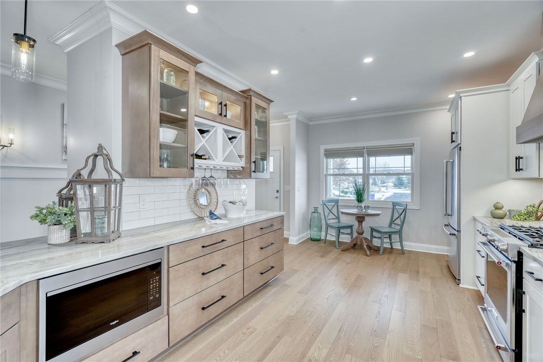 Dining room, Interior, Kitchen, Recessed Lighting, Stainless Steel Appliances, Wood Texture Flooring