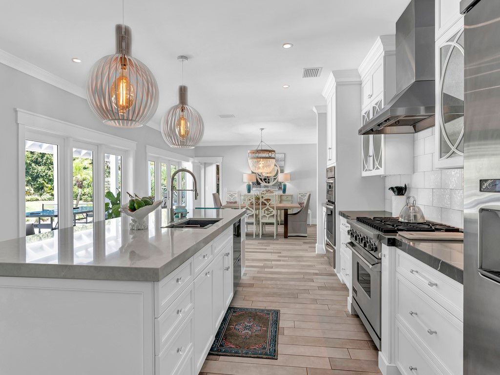 Chandelier, Interior, Kitchen, Pendant Lights, Recessed Lighting, Stainless Steel Appliances, Wood Texture Flooring