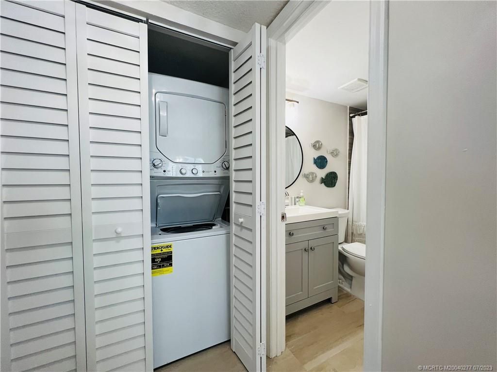 Bathroom, Interior, Utility Closets, Washer, Wood Texture Flooring