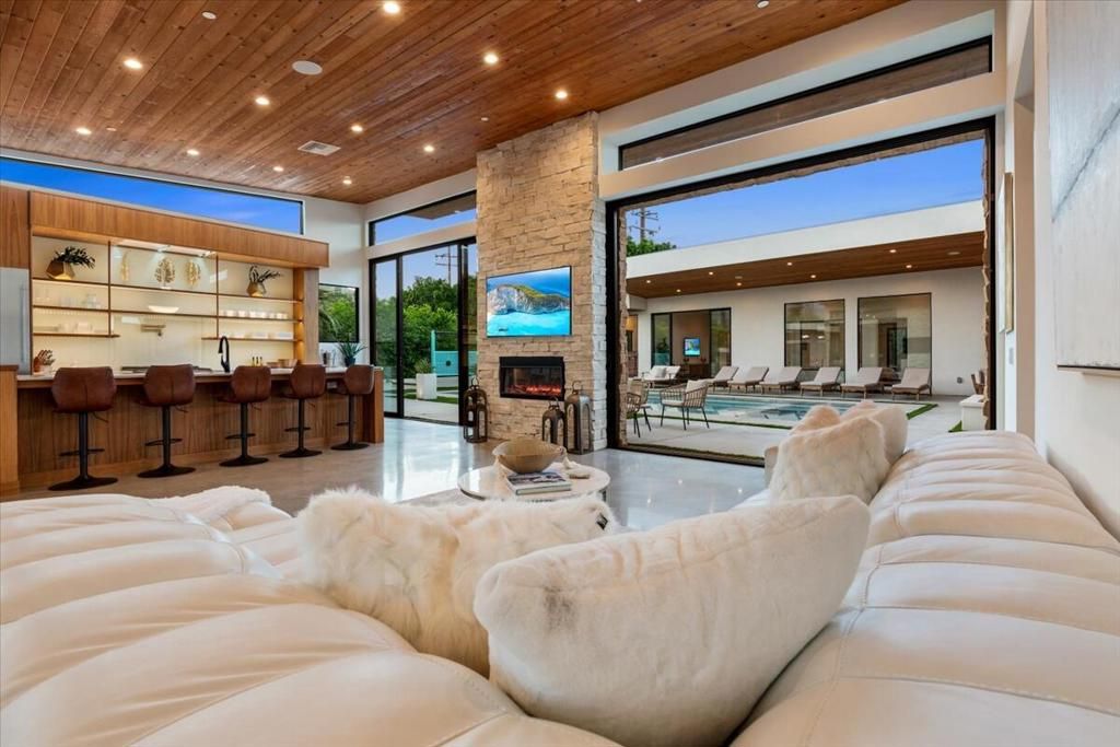 Fireplace, Interior, Living room, Recessed Lighting, Stone Walls, Wooden Ceilings