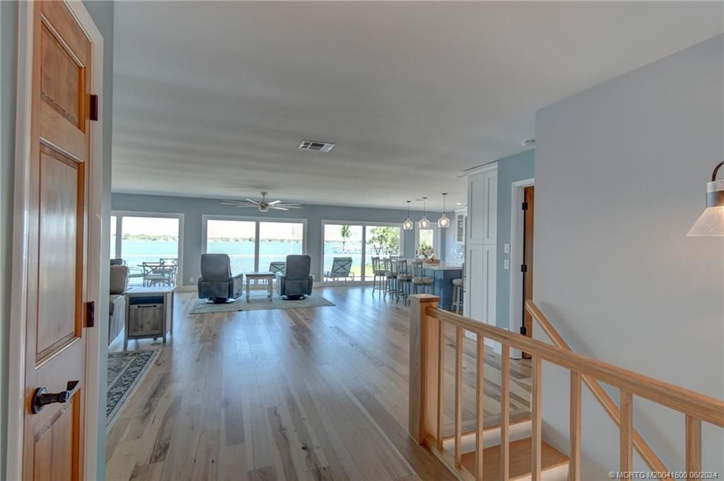 Fireplace, Interior, Pendant Lights, Water, Wood Texture Flooring