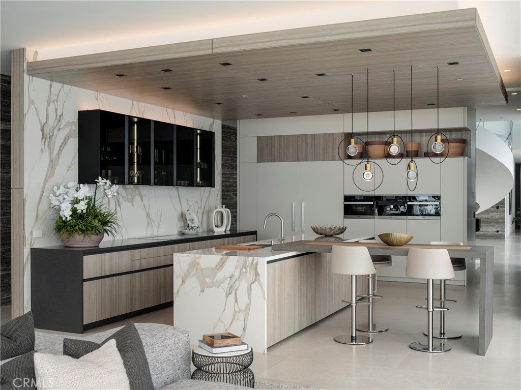 Interior, Kitchen, Marble Walls, Pendant Lights, Recessed Lighting, Stainless Steel Appliances