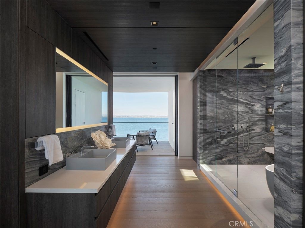 Bathroom, Glass Shower, Interior, Marble Walls, Water, Wood Texture Flooring