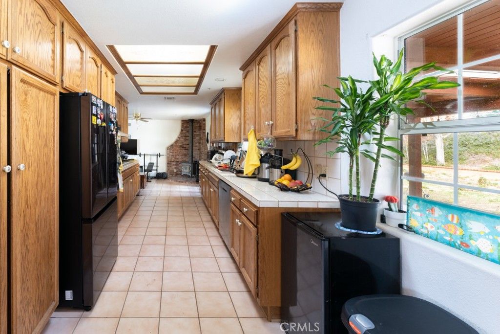 Interior, Kitchen, Recessed Lighting, Stone Walls, Tile Countertops