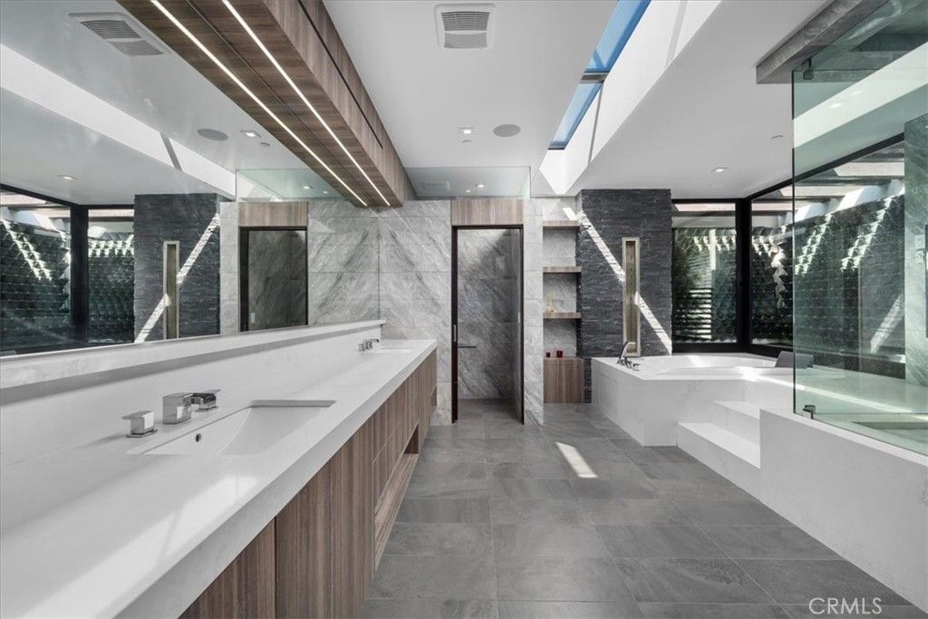 Bathroom, Dual Sink Vanities, Glass Shower, Interior, Marble Walls, Recessed Lighting