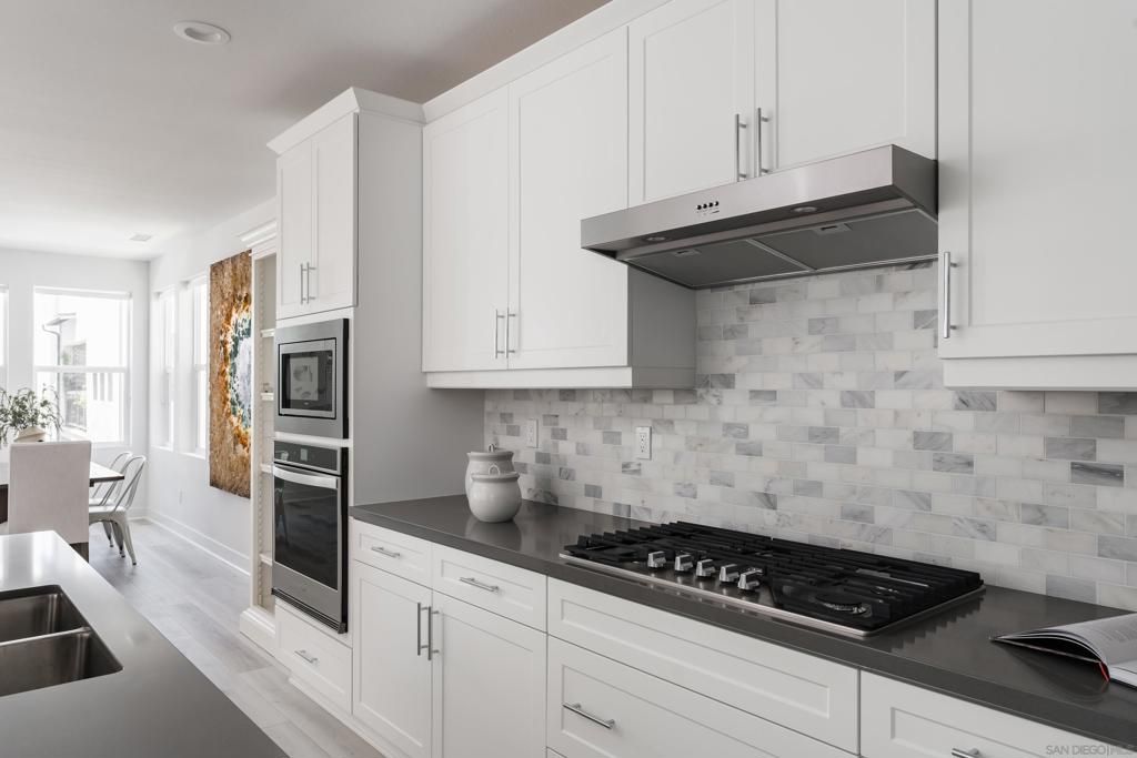 Dining room, Interior, Kitchen, Recessed Lighting, Stainless Steel Appliances, Wood Texture Flooring