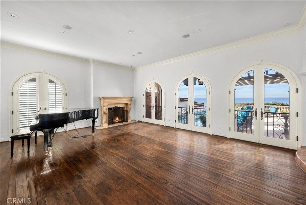 Fireplace, Interior, Piano, Recessed Lighting, Water, Wood Texture Flooring