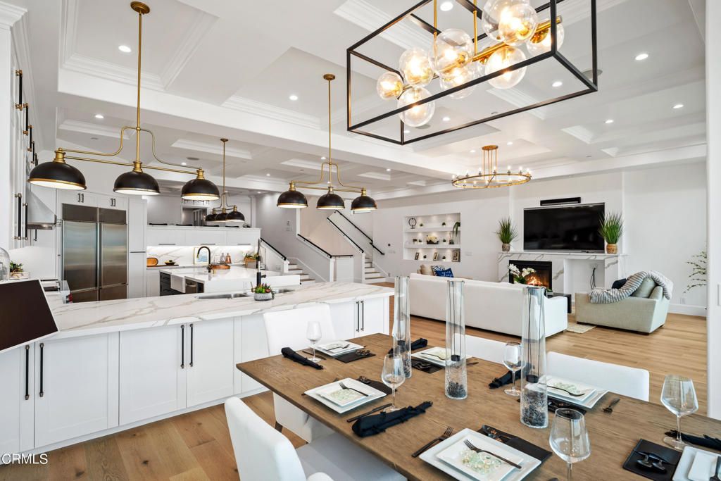 Fireplace, Interior, Kitchen, Living room, Pendant Lights, Recessed Lighting, Stainless Steel Appliances, Wood Texture Flooring