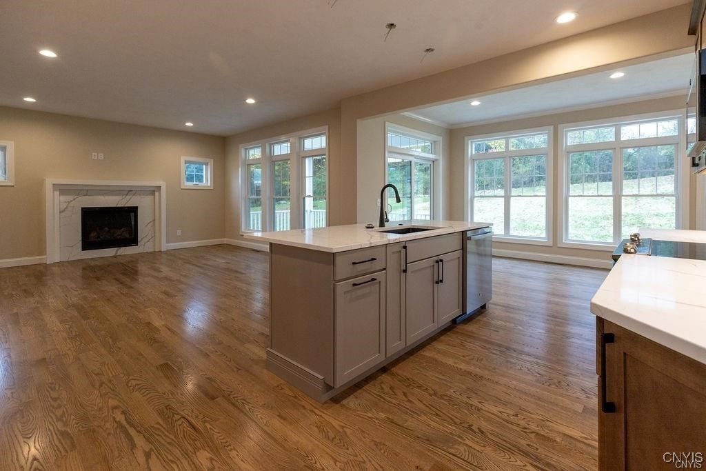 Fireplace, Interior, Kitchen, Recessed Lighting, Wood Texture Flooring