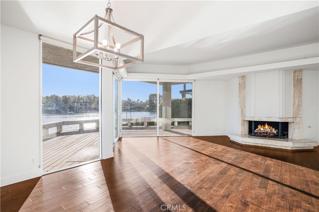 Fireplace, Interior, Pendant Lights, Water, Wood Texture Flooring