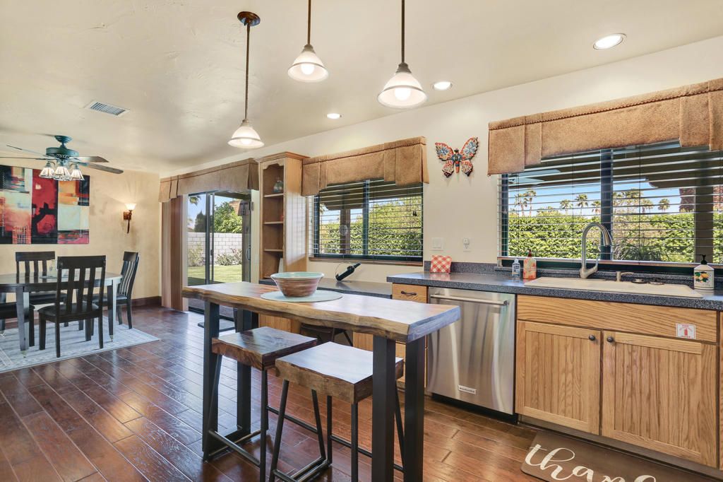 Dining room, Interior, Kitchen, Pendant Lights, Recessed Lighting, Stainless Steel Appliances, Wood Texture Flooring