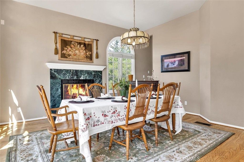 Dining room, Fireplace, Interior, Pendant Lights, Wood Texture Flooring