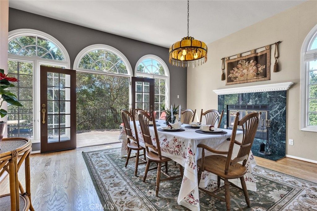 Chandelier, Dining room, Fireplace, Interior, Pendant Lights, Wood Texture Flooring