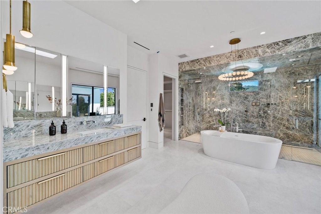 Bathroom, Dual Sink Vanities, Free Standing Baths, Glass Shower, Interior, Marble Walls, Pendant Lights, Recessed Lighting
