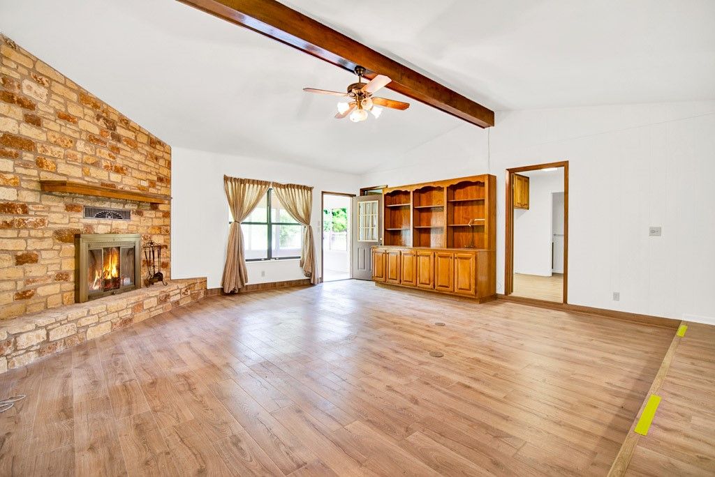 Empty room, Fireplace, Interior, Stone Walls, Wooden Beams, Wood Texture Flooring