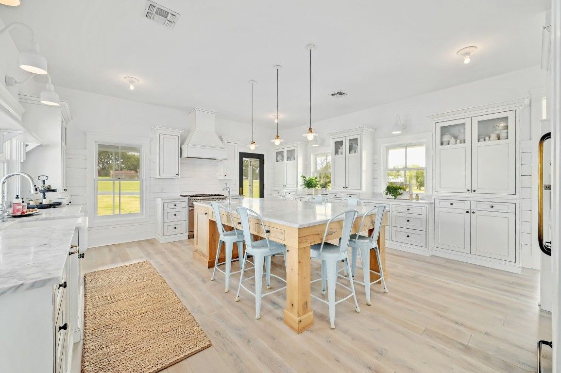 Dining room, Interior, Kitchen, Pendant Lights, Stainless Steel Appliances, Wood Texture Flooring