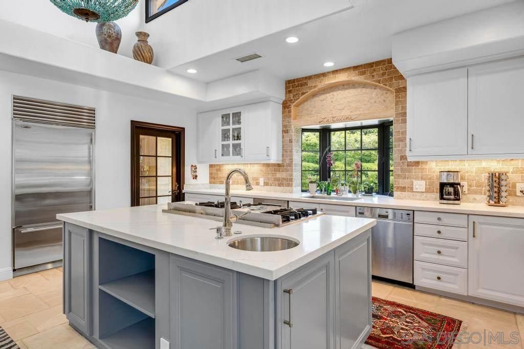Interior, Kitchen, Recessed Lighting, Stainless Steel Appliances, Stone Walls