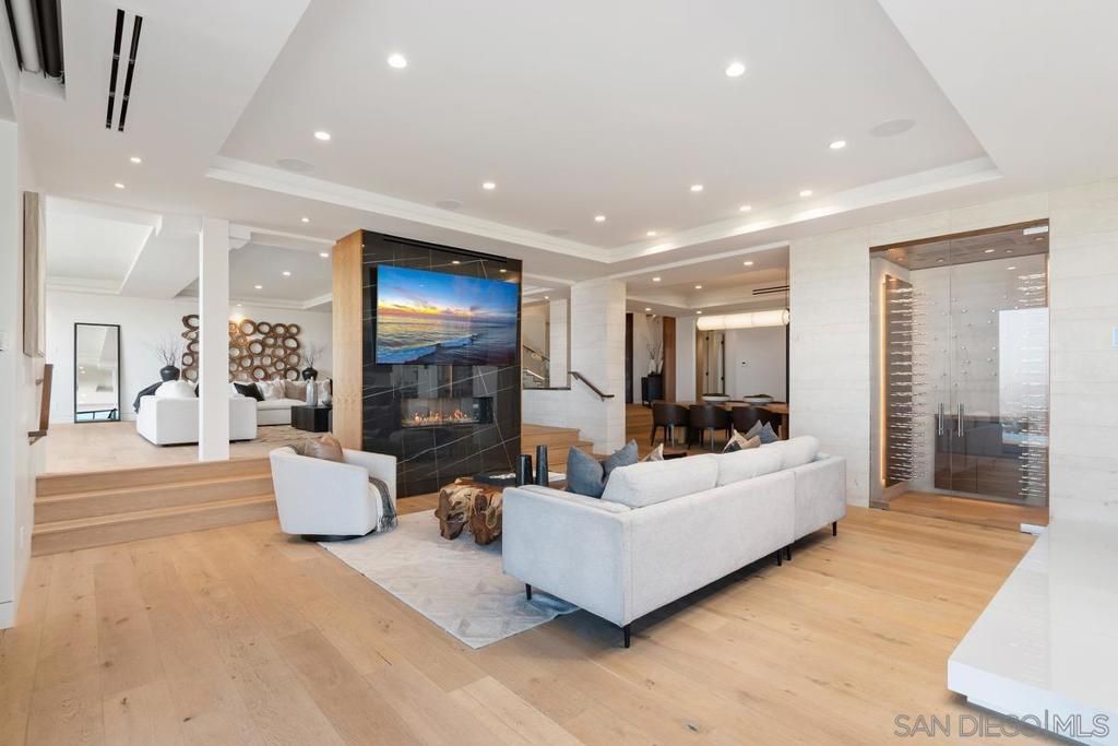 Dining room, Fireplace, Interior, Living room, Recessed Lighting, Wood Texture Flooring