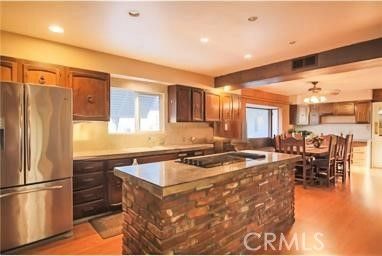 Dining room, Interior, Kitchen, Pendant Lights, Recessed Lighting, Stainless Steel Appliances, Wooden Beams, Wood Texture Flooring