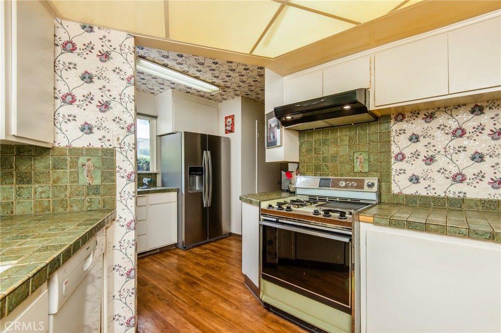 Interior, Kitchen, Stainless Steel Appliances, Tile Countertops, Wood Texture Flooring