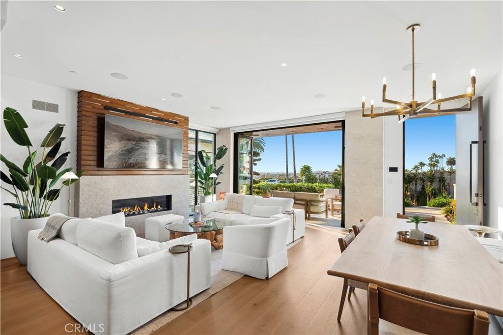 Dining room, Fireplace, Interior, Living room, Pendant Lights, Recessed Lighting, Wood Texture Flooring