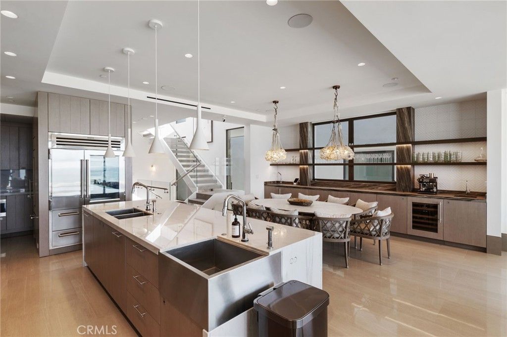 Chandelier, Dining room, Interior, Kitchen, Pendant Lights, Recessed Lighting, Stainless Steel Appliances, Wood Texture Flooring