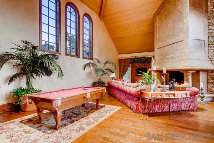 Billiard Table, Fireplace, Game Room, Interior, Living room, Stone Walls, Wooden Ceilings, Wood Texture Flooring