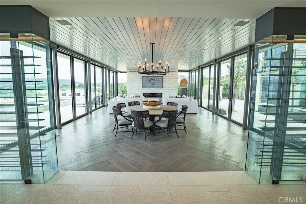 Dining room, Fireplace, Interior, Pendant Lights, Stone Walls, Wood Texture Flooring