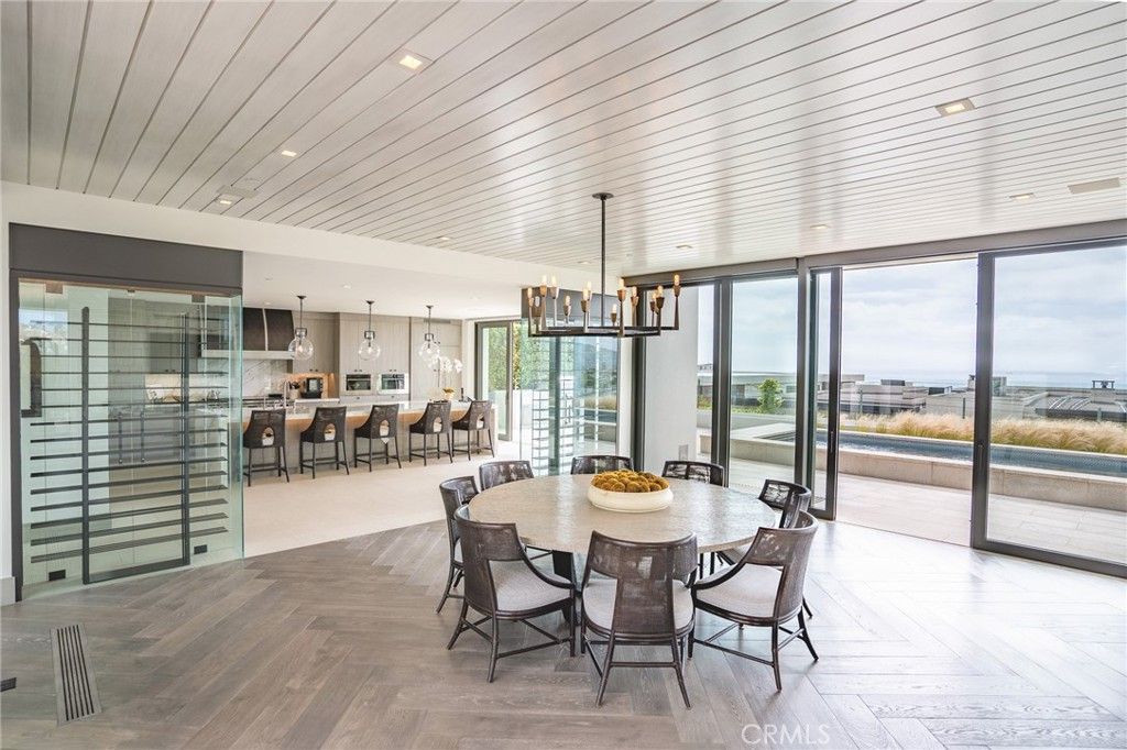 Dining room, Interior, Kitchen, Pendant Lights, Recessed Lighting, Stainless Steel Appliances, Water, Wood Texture Flooring