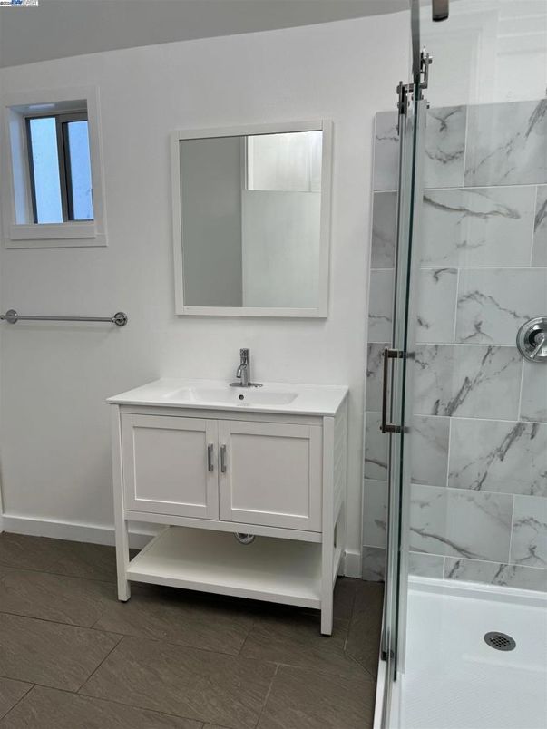 Bathroom, Dual Sink Vanities, Glass Shower, Interior, Marble Walls