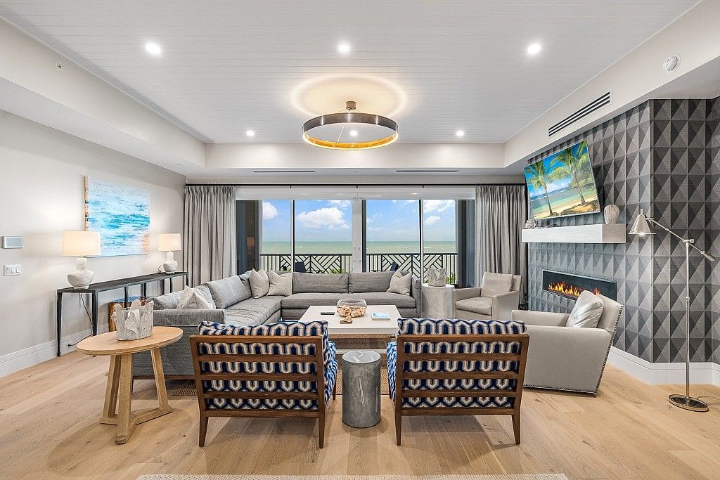 Fireplace, Interior, Living room, Pendant Lights, Recessed Lighting, Water, Wood Texture Flooring
