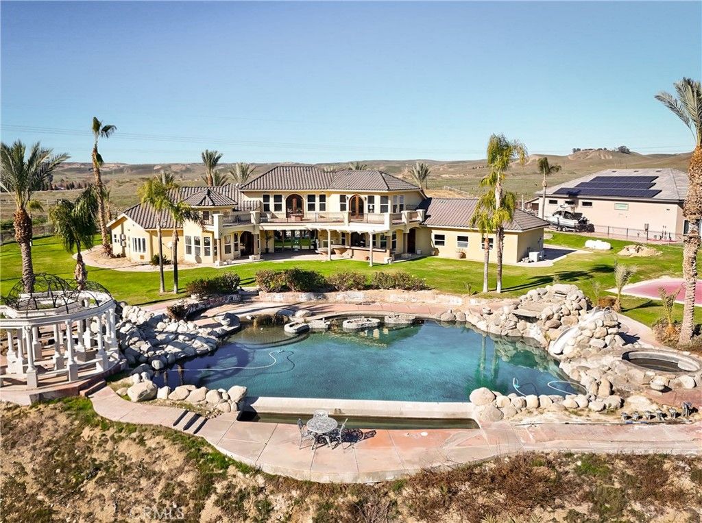 Exterior, Pool, Solar Panels