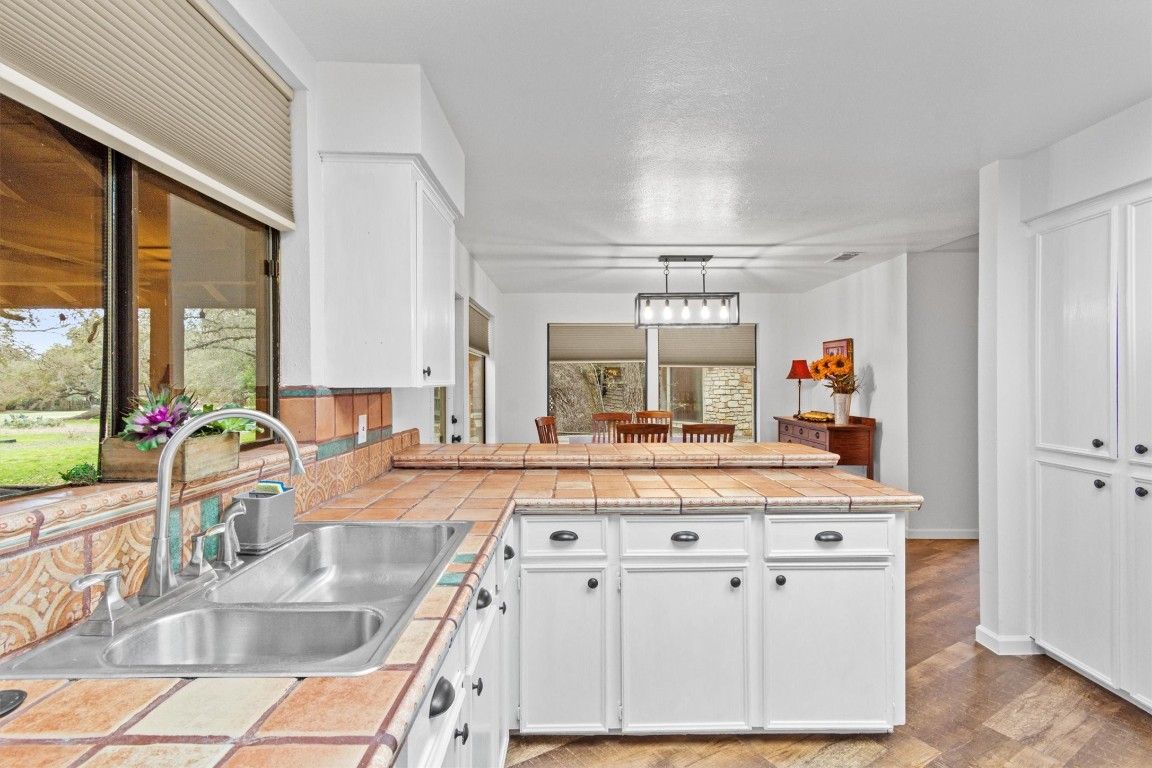 Dining room, Interior, Kitchen, Pendant Lights, Tile Countertops, Wood Texture Flooring