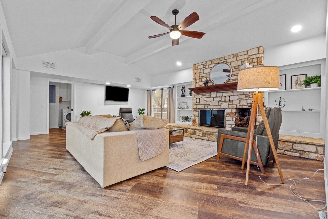 Fireplace, Interior, Living room, Recessed Lighting, Stone Walls, Wood Texture Flooring