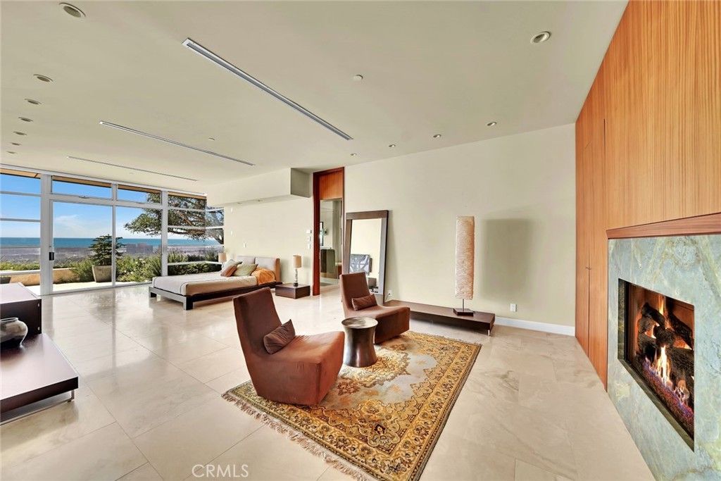 Fireplace, Interior, Living room, Recessed Lighting, Water, Wooden Walls