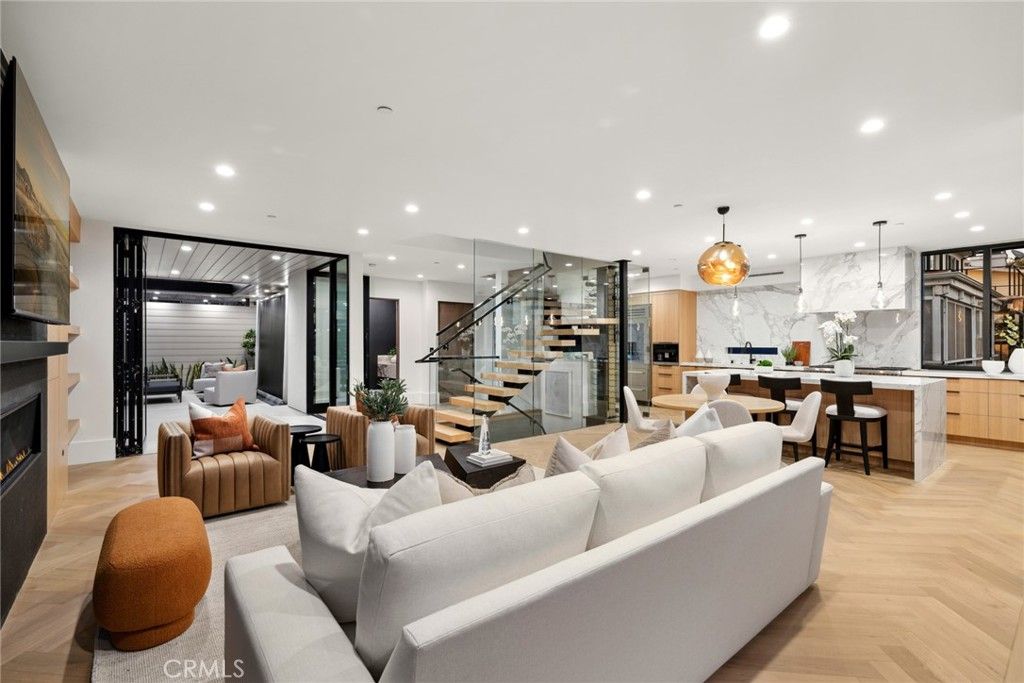 Dining room, Fireplace, Interior, Kitchen, Living room, Marble Walls, Pendant Lights, Recessed Lighting, Wood Texture Flooring