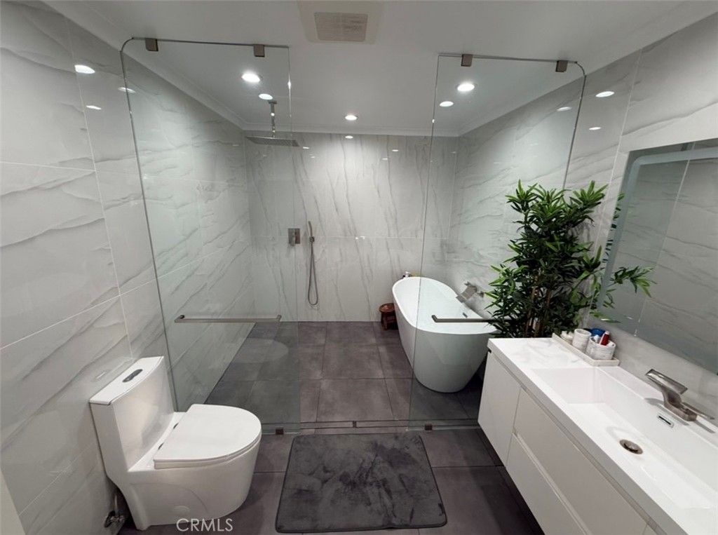 Bathroom, Free Standing Baths, Glass Shower, Interior, Marble Walls, Recessed Lighting