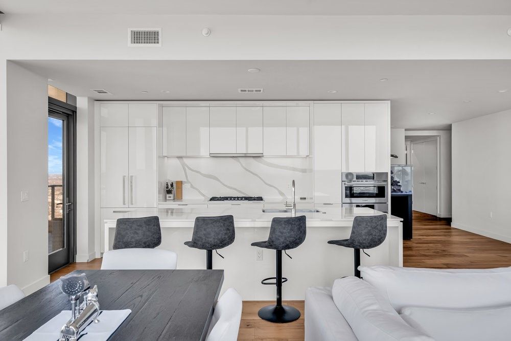 Interior, Kitchen, Marble Walls, Recessed Lighting, Stainless Steel Appliances, Wood Texture Flooring