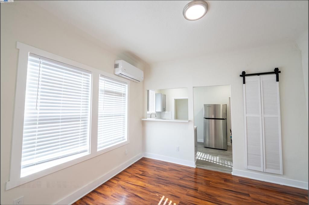 Empty room, Interior, Kitchen, Stainless Steel Appliances, Wood Texture Flooring
