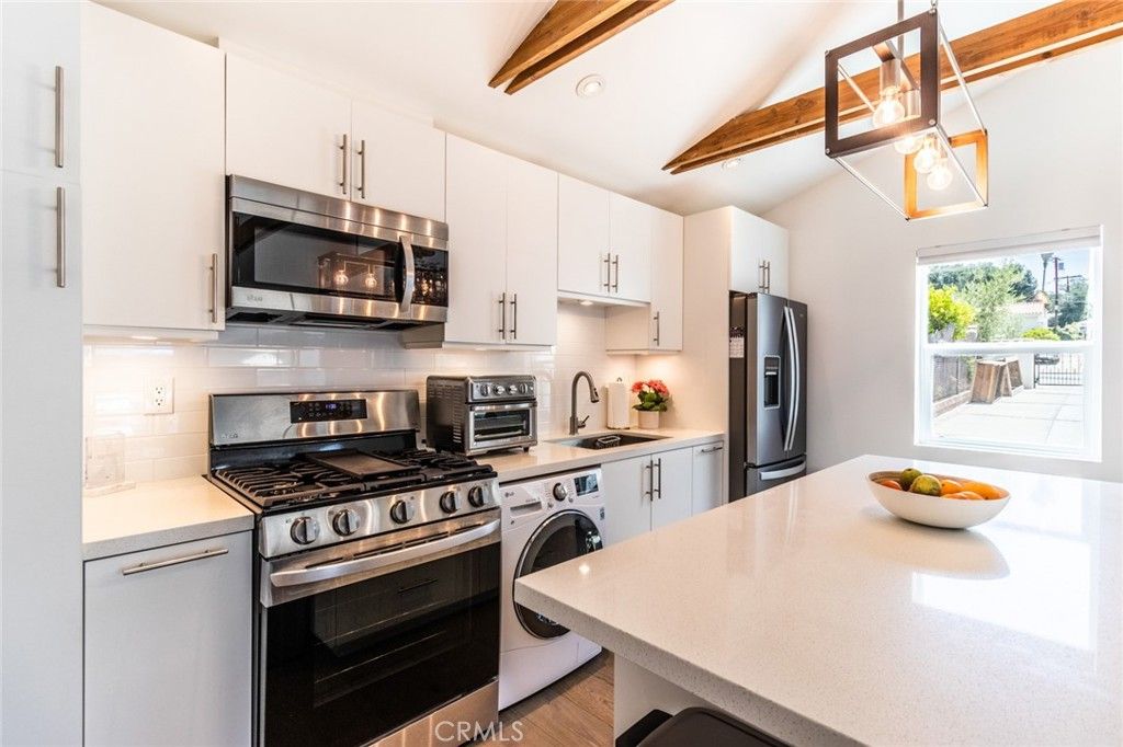 Interior, Kitchen, Recessed Lighting, Stainless Steel Appliances, Washer, Wooden Beams, Wood Texture Flooring