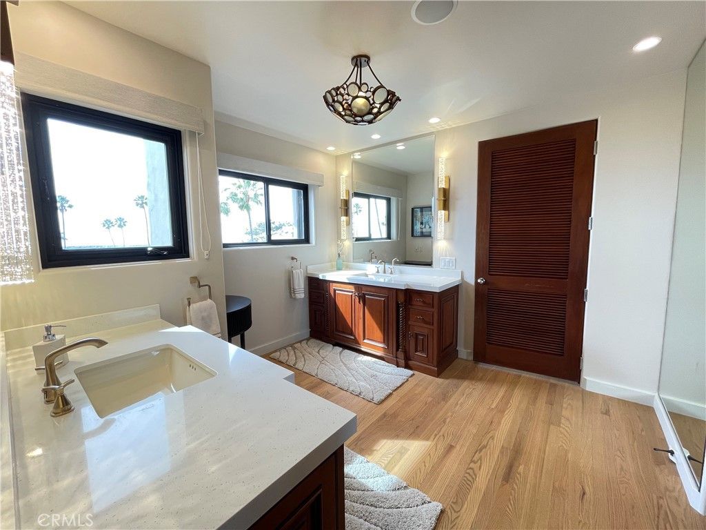 Bathroom, Dual Sink Vanities, Interior, Recessed Lighting, Wood Texture Flooring