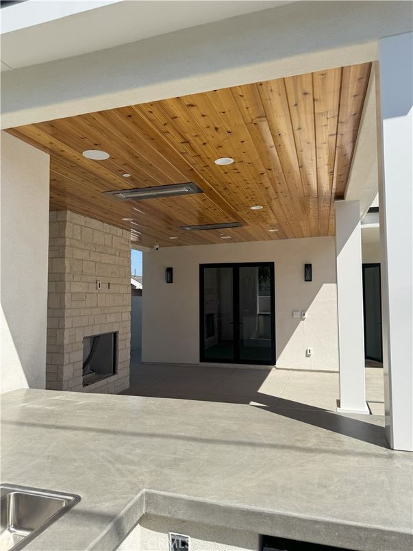 Fireplace, Interior, Recessed Lighting, Stone Walls, Wooden Ceilings