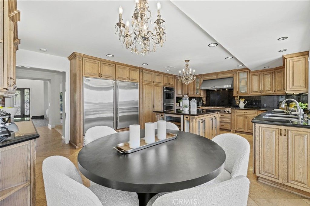 Chandelier, Dining room, Interior, Kitchen, Recessed Lighting, Stainless Steel Appliances, Wood Texture Flooring