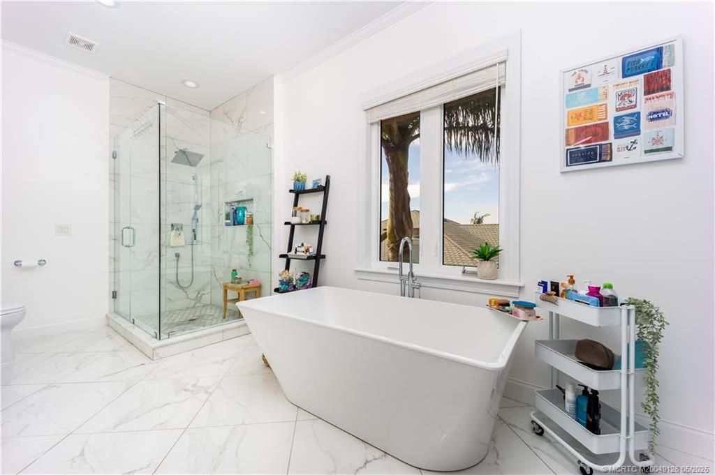 Bathroom, Free Standing Baths, Glass Shower, Interior, Marble, Marble Walls, Recessed Lighting
