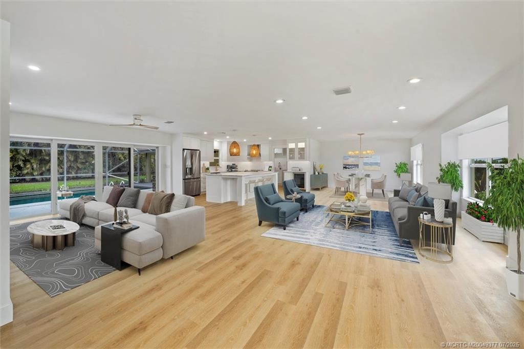 Dining room, Interior, Kitchen, Living room, Pendant Lights, Recessed Lighting, Stainless Steel Appliances, Wood Texture Flooring