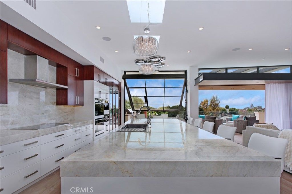 Chandelier, Interior, Kitchen, Pendant Lights, Recessed Lighting, Stainless Steel Appliances, Wood Texture Flooring