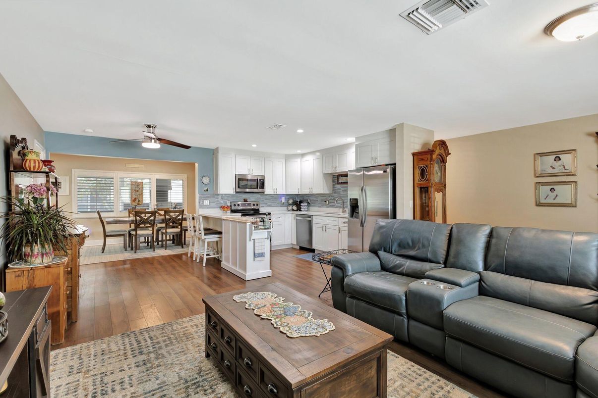 Dining room, Interior, Kitchen, Living room, Recessed Lighting, Stainless Steel Appliances, Wood Texture Flooring