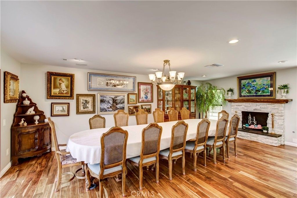 Chandelier, Dining room, Fireplace, Interior, Recessed Lighting, Wood Texture Flooring